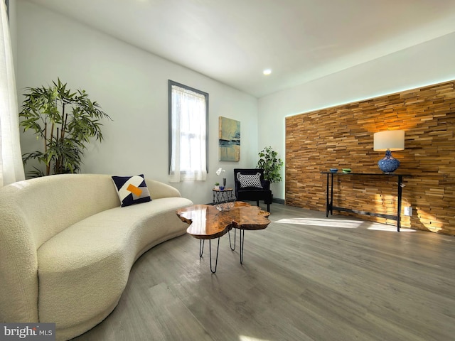 living area featuring hardwood / wood-style floors