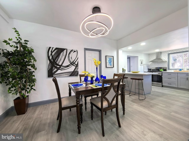 dining room with light hardwood / wood-style floors