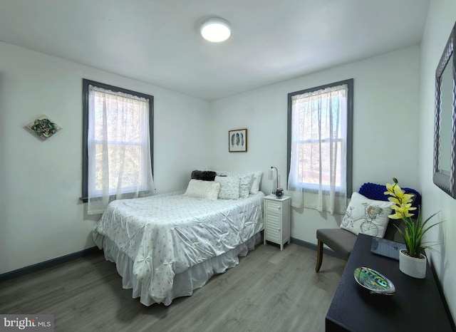 bedroom featuring hardwood / wood-style floors