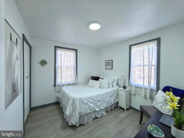 bedroom featuring light hardwood / wood-style floors