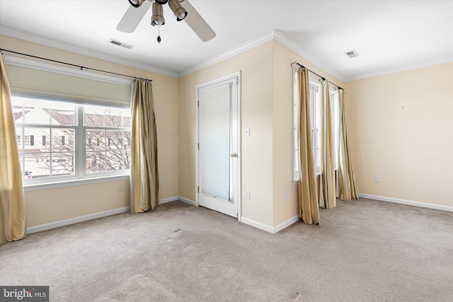 unfurnished bedroom featuring ceiling fan, light colored carpet, ornamental molding, and multiple windows