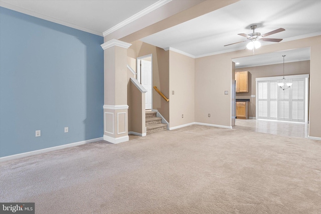 unfurnished living room featuring ceiling fan with notable chandelier, light colored carpet, and crown molding