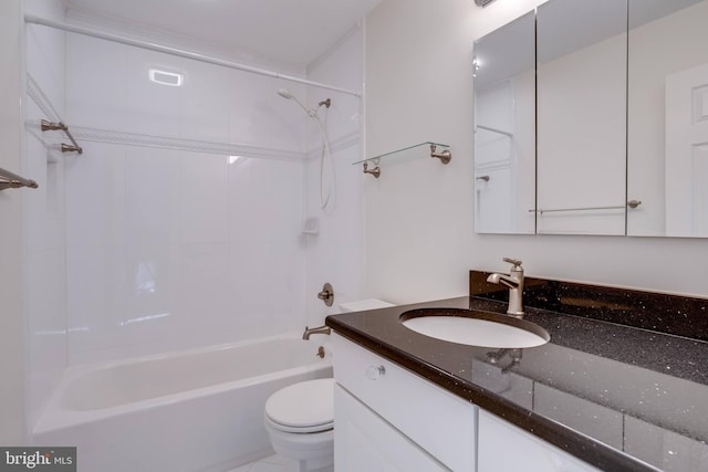 full bathroom with toilet, vanity, and tiled shower / bath combo