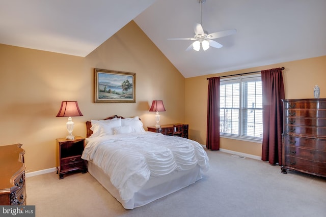 carpeted bedroom featuring ceiling fan and lofted ceiling