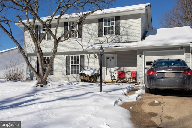 view of front of home with a garage