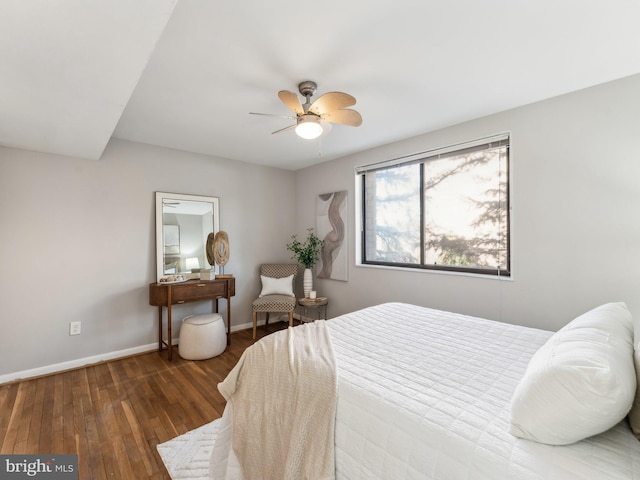 bedroom featuring ceiling fan and dark hardwood / wood-style flooring