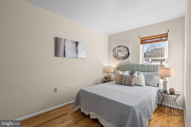 bedroom featuring hardwood / wood-style flooring