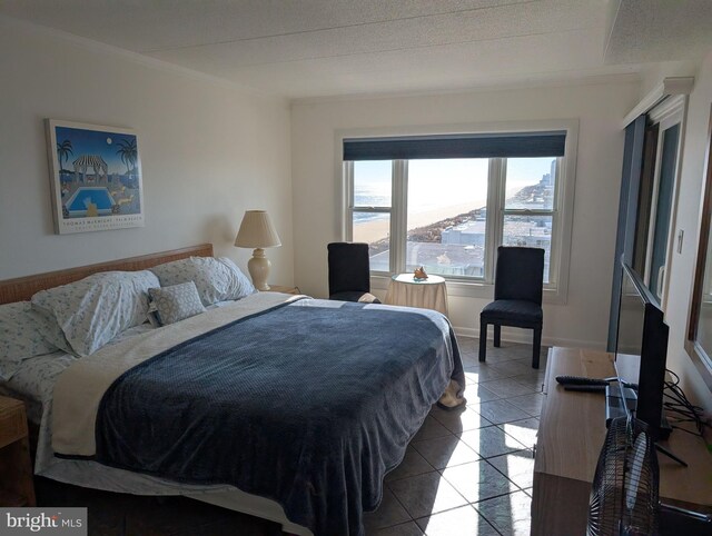 bedroom featuring tile patterned flooring