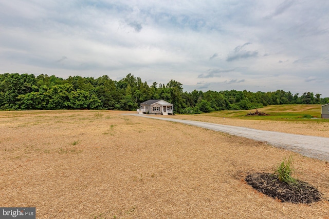 exterior space with a rural view