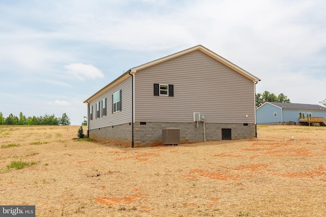 view of home's exterior featuring central air condition unit