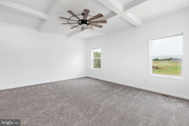 carpeted spare room with ceiling fan, beam ceiling, and coffered ceiling