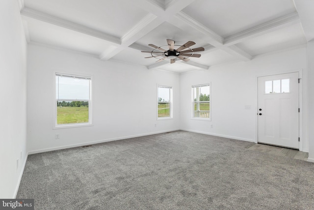 unfurnished room with beamed ceiling, carpet flooring, ceiling fan, and coffered ceiling