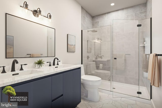 bathroom with an enclosed shower, vanity, and toilet