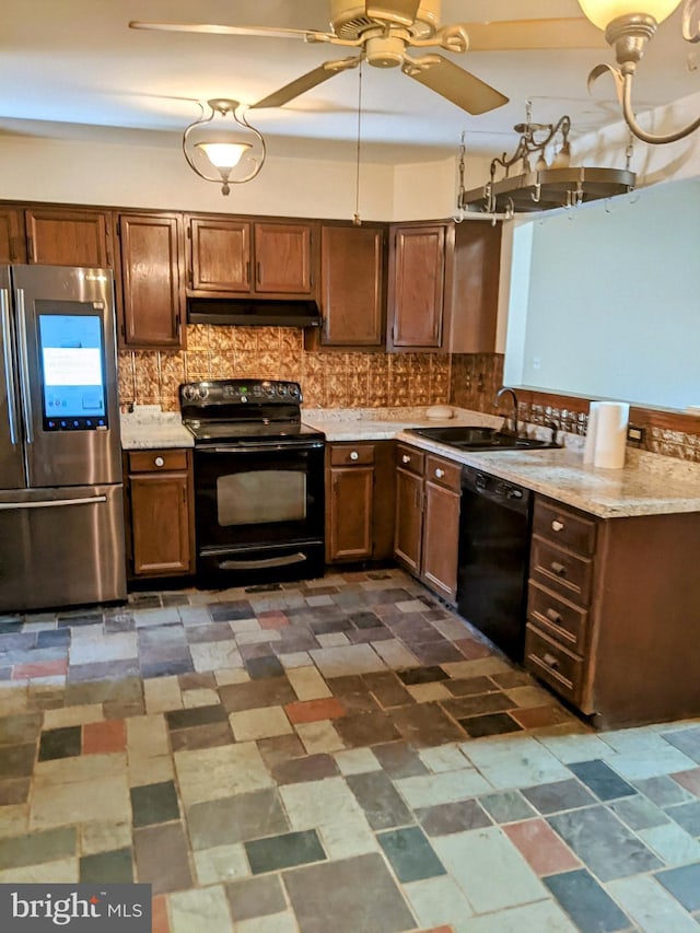 kitchen with ceiling fan, sink, black appliances, and tasteful backsplash