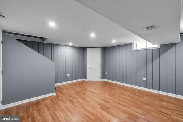 basement featuring light wood-type flooring