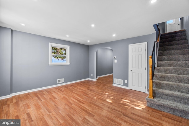 spare room featuring light hardwood / wood-style floors