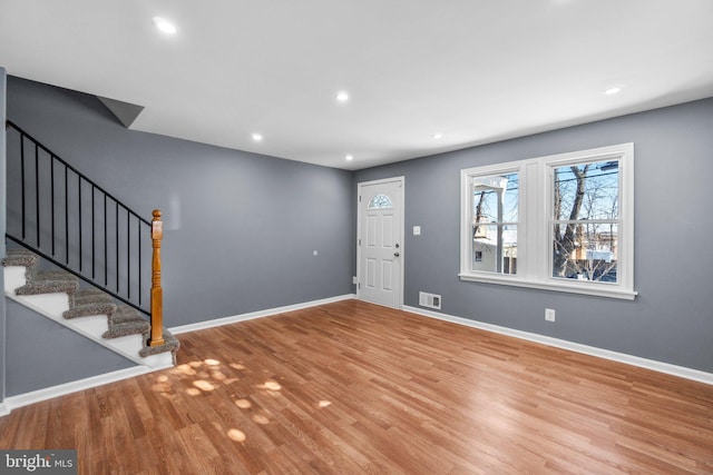 foyer featuring hardwood / wood-style floors