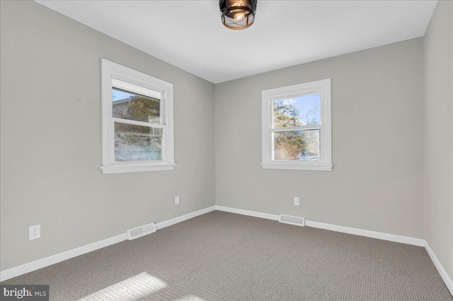 empty room with carpet floors