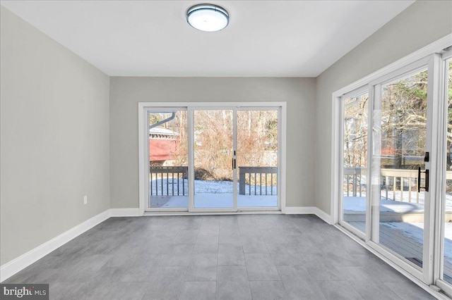 spare room with plenty of natural light