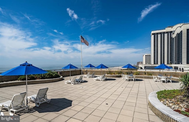 view of patio / terrace featuring a water view