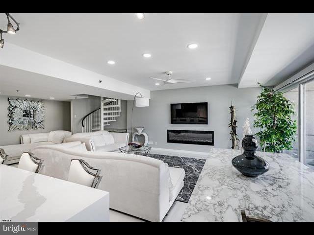 living room with ceiling fan