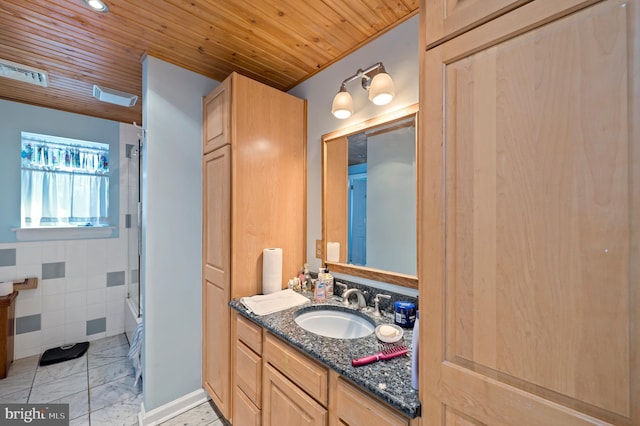 bathroom with wooden ceiling, vanity, and bath / shower combo with glass door