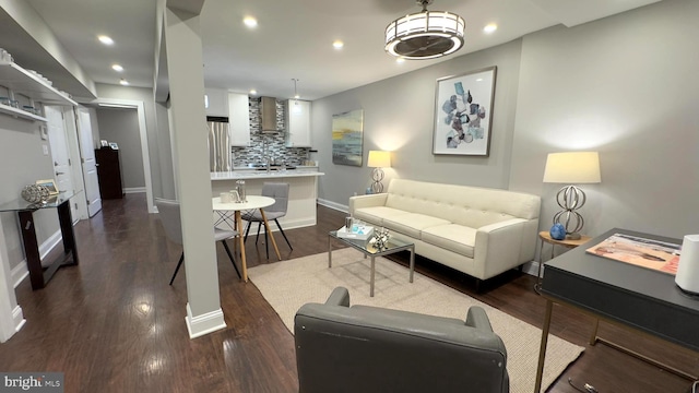 living room featuring dark hardwood / wood-style floors