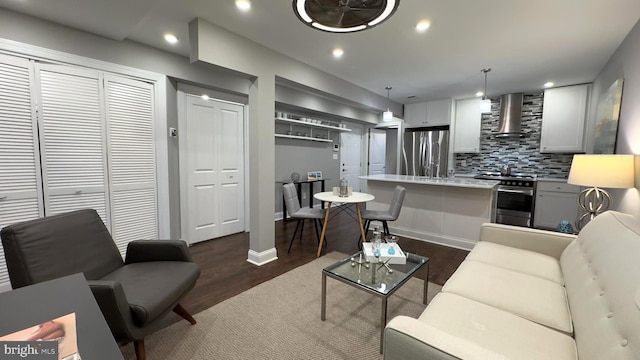 living room featuring dark hardwood / wood-style floors