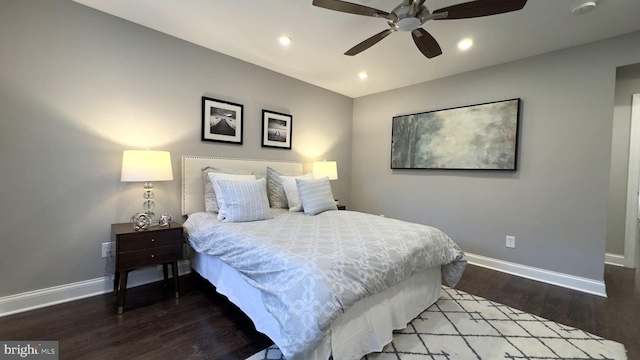 bedroom featuring hardwood / wood-style flooring and ceiling fan