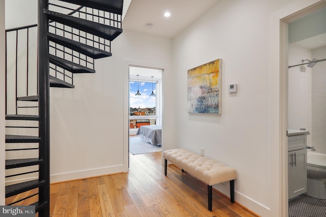 corridor featuring light hardwood / wood-style flooring