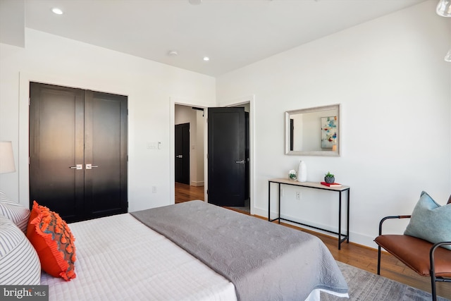 bedroom featuring hardwood / wood-style floors