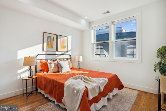 bedroom featuring hardwood / wood-style floors