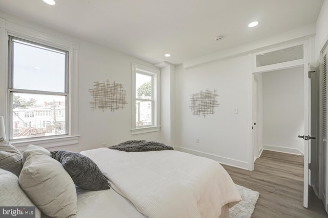 bedroom featuring dark hardwood / wood-style floors