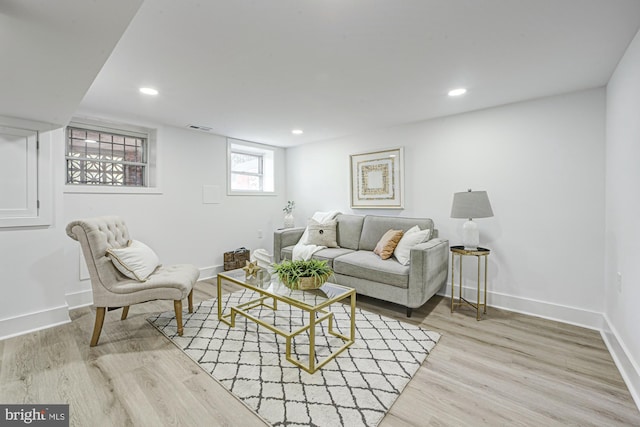 living room with light hardwood / wood-style floors