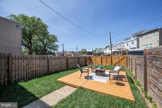 view of yard with outdoor lounge area and a deck