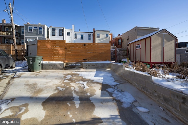 exterior space featuring a storage unit