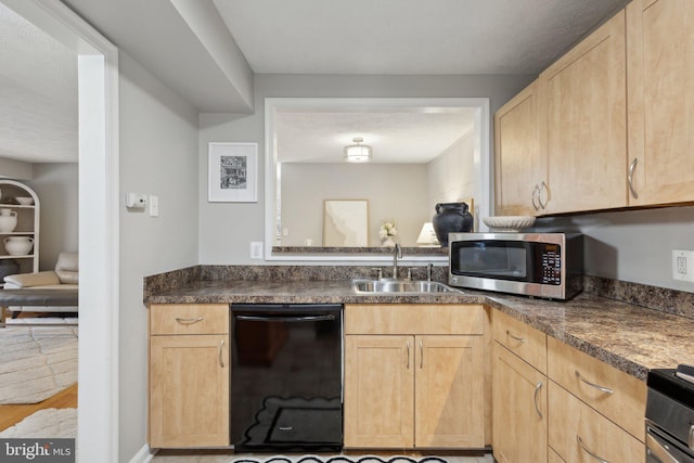 kitchen featuring electric range, sink, light brown cabinets, and black dishwasher