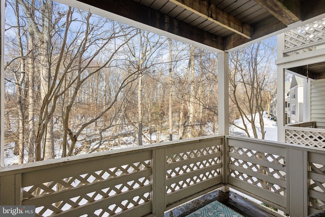 view of snow covered deck