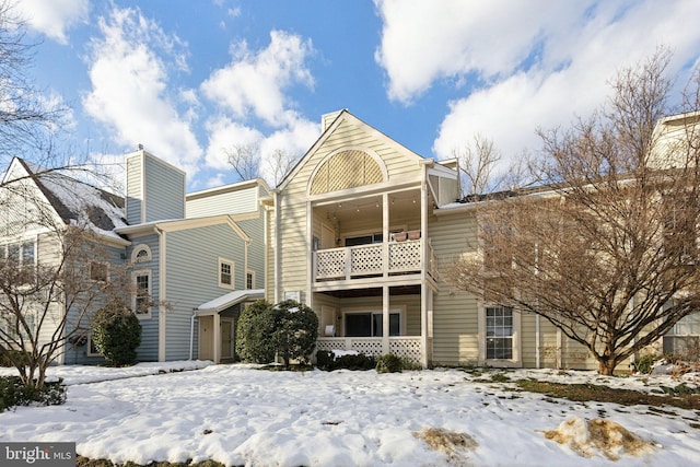 view of snow covered property