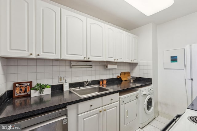 kitchen with white cabinets, stainless steel dishwasher, sink, and washer / clothes dryer