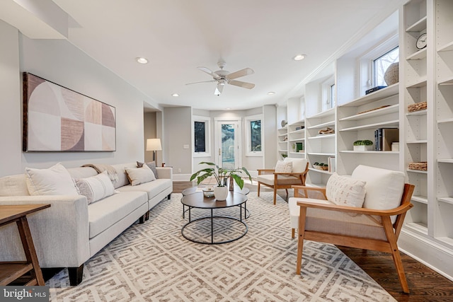 living room with ceiling fan, baseboards, wood finished floors, and recessed lighting