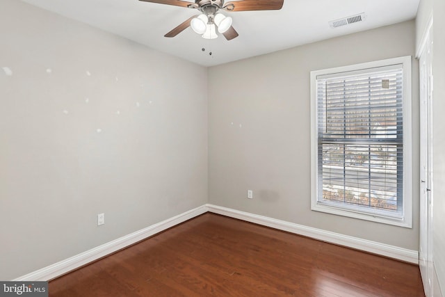 unfurnished room with ceiling fan and wood-type flooring