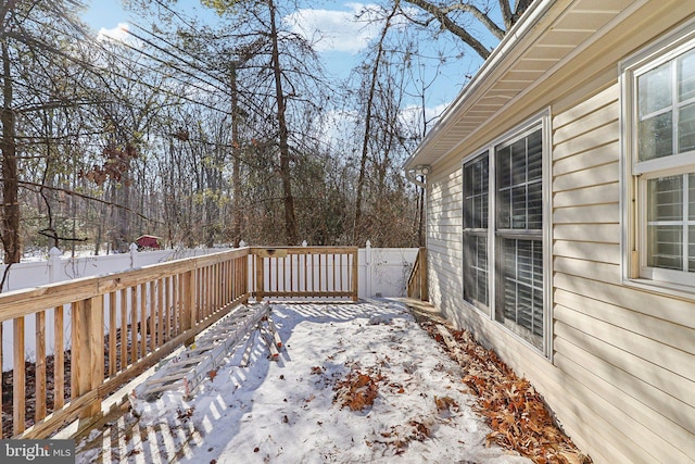 view of snow covered deck