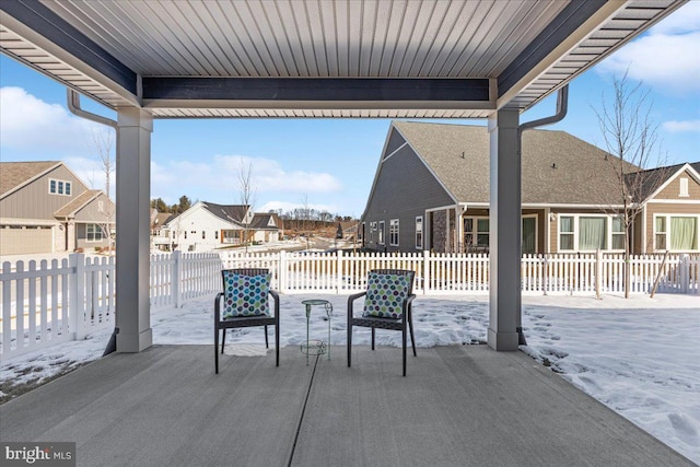 view of snow covered patio