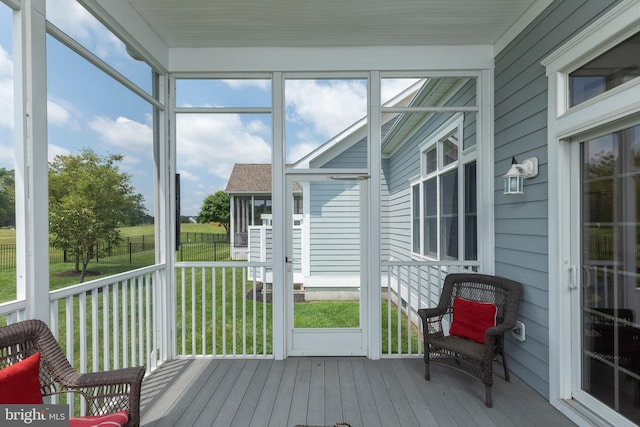 sunroom with plenty of natural light