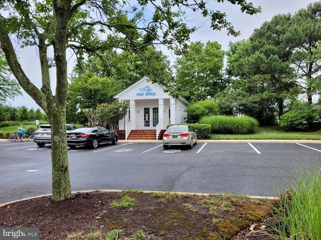 view of car parking with french doors