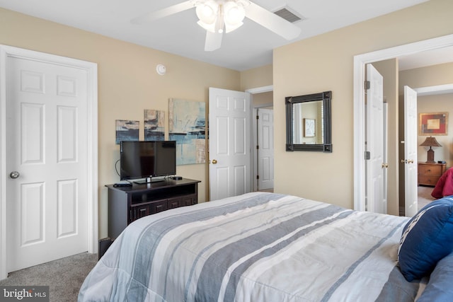 bedroom featuring ceiling fan and carpet floors