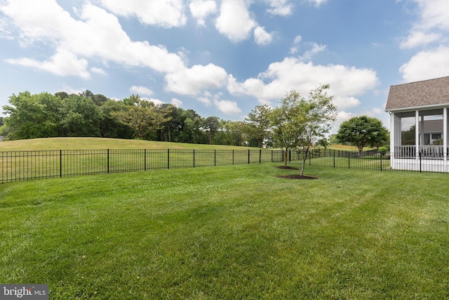 view of yard with a rural view