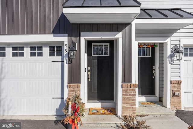 property entrance with a garage