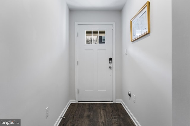 doorway to outside featuring dark wood-type flooring